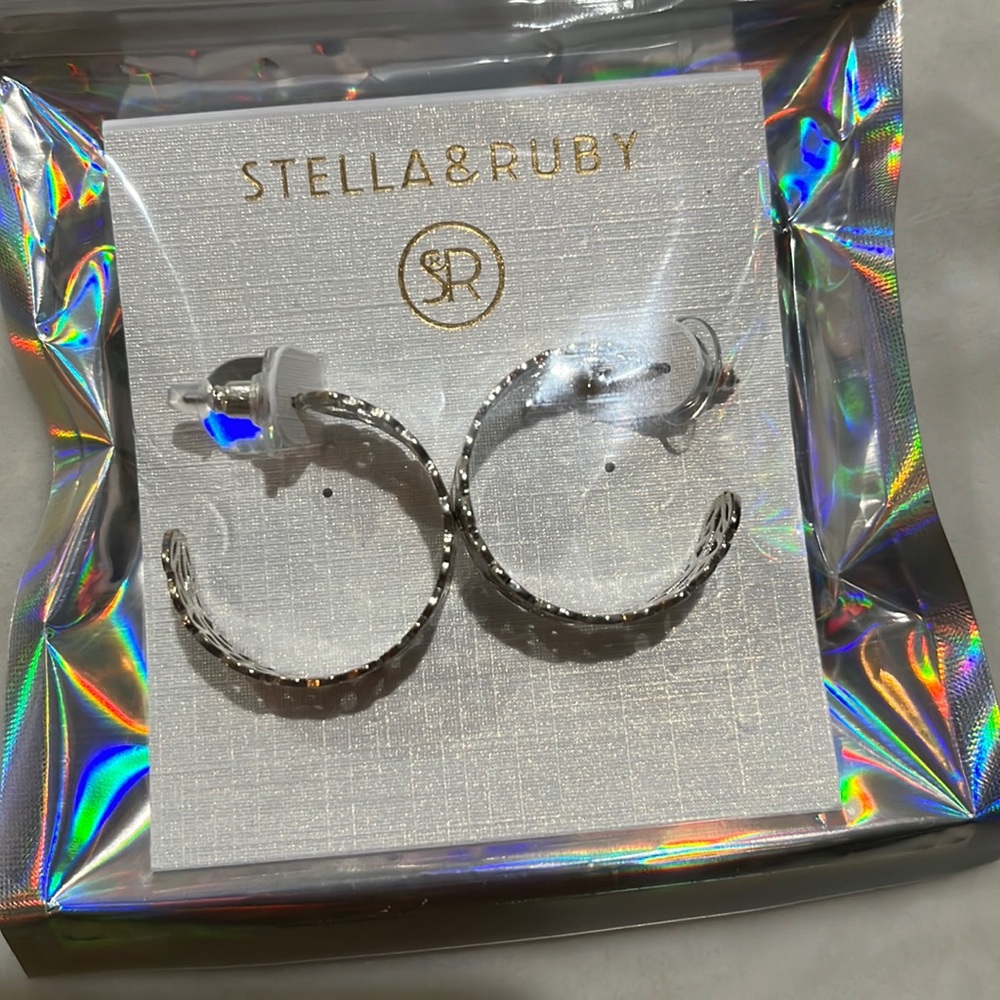 Stella & Ruby silver hoop earrings with scroll design.  Never worn.
